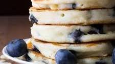 Extra Fluffy Almond Blueberry Pancakes- greek yogurt makes these pancakes so thick and fluffy!