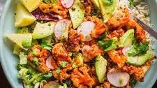 Recipe: Spicy Buffalo Cauliflower Bowls with Avocado and Green Tahini