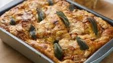 Sweet potato focaccia with Grana Padano, onions and sage