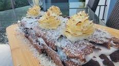 Yule Go Coconuts Over This Log with Cherry Jubilee Sauce.