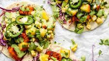 Chipotle Lime Salmon Tacos with Corn Avocado Peach Salsa & Cilantro Yogurt Sauce