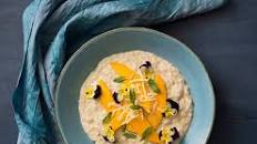 Coconut rice pudding with fresh mango