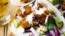 Crispy Baked Fish Tacos with Creamy Cilantro Lime Slaw