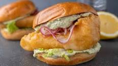 Crunchy beer-battered fish sandwich with avocado tartare sauce