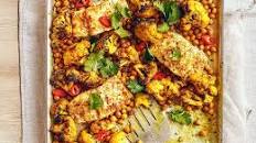 Curried butter-baked cod with cauliflower & chickpeas