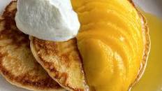 Fluffy pancakes with mango butterscotch sauce