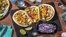 Fried Sea Bass Tacos with Chipotle Sauce, Cilantro Slaw and Pineapple Salsa