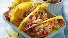 Grilled salmon tacos with avocado salsa