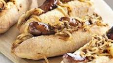Maple-glazed hot dogs with mustardy onions