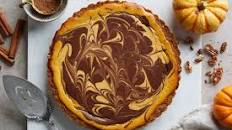 Marbled Chocolate Cheesecake Pumpkin Tart With A Biscoff Pecan Crust