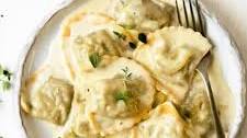 Mushroom Ravioli In A Parmesan Cream Sauce