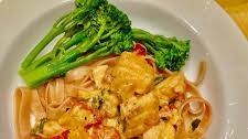 Quick Pasta with Salmon and Tomatoes in Cream Sauce