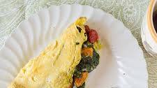 Roasted Tomato Omelet with Spinach, Pesto & Cheese