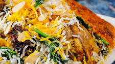 Saffron Rice with Chicken, Yogurt and Spinach (Tahchin Esfenaj)