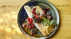 Sea bass with tomato, olive and herb sauce