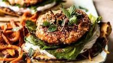 Sesame Crusted Curried Salmon Burgers with Lemony Herbs.