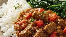 Spicy Jamaican Beef Curry with Coconut Rice and Sauteed Spinach