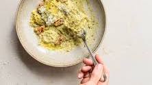 Spinach and Ricotta Ravioli with Black Truffle Pesto