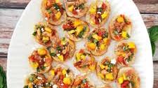 Sun-Dried Tomato and Mango Crostini