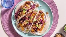 Sweet Chili Pork Tacos with spicy aioli drizzle