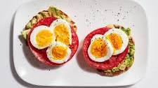 Tomato, egg, and avocado breakfast sandwich