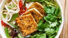 Vegan pho with spicy tofu
