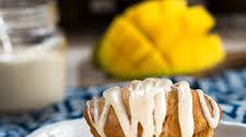 Warm Cinnamon Ginger Mango Muffins with Vanilla Bean Glaze