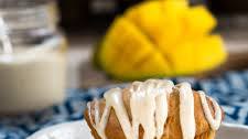 Warm Cinnamon Ginger Mango Muffins with Vanilla Bean Glaze
