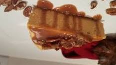Pumpkin Cheesecake with Bourbon Pecan Sauce