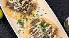 Beef Barbacoa Tacos with Fire Roasted Poblano Crema