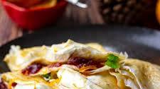 Christmas Crepes With Orange Cream and Cranberry Sauce