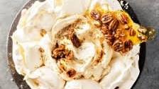Cinnamon and candied pecan pavlova with crème fraîche
