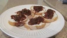 Goat-Ricotta Crostini with Spicy Onion & Garlic Jam