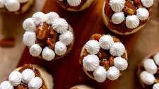 Mini Pecan Pie Cheesecakes with Boozy Maple Whipped Cream