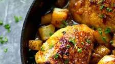 Skillet Honey Garlic Chicken Thighs with Roast Potatoes