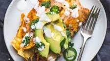 Spicy Black Bean Chicken Enchiladas with Pumpkin Sour Cream Sauce