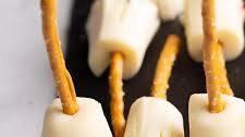 String Cheese Pretzel Broomsticks