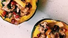 Stuffed acorn squash with chicken Italian sausage and apple