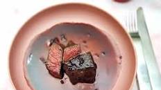 Venison steaks with red sauce